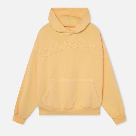 Yellow hoodie with 'Hollister' branding on a light gray background