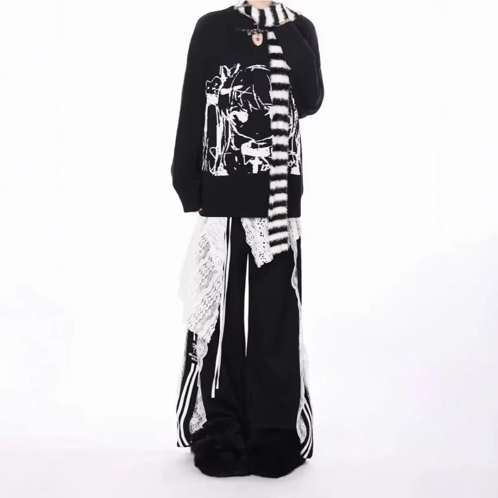 Black and white outfit with a patterned scarf on a white background