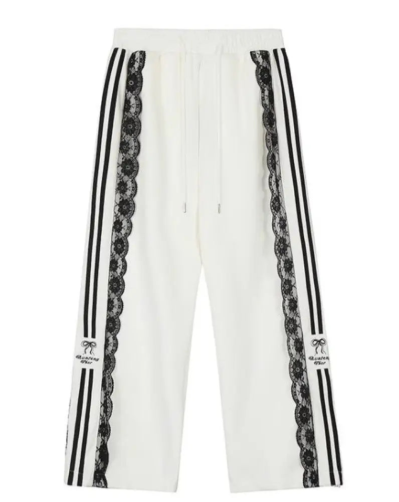 White pants with black stripes and lace details on a white background