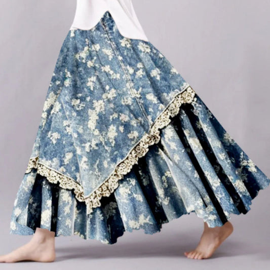 Blue floral skirt with white lace trim on a gray background