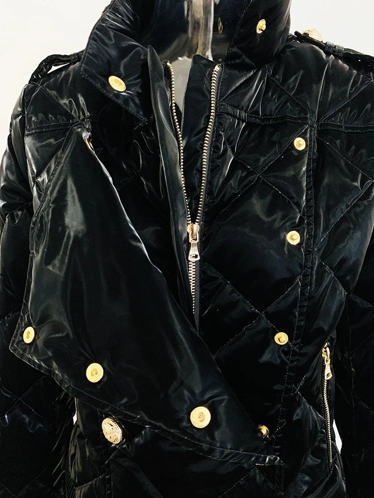 Black quilted jacket with gold buttons and zippers on a mannequin against a white background