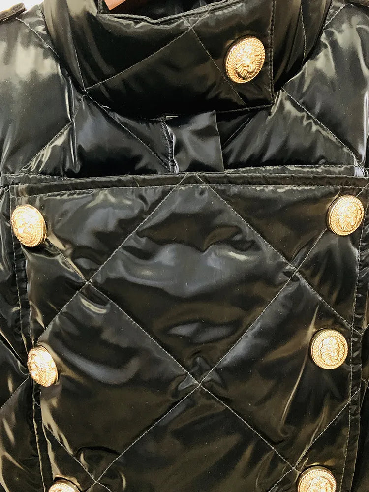 Close-up of a black quilted jacket with gold buttons