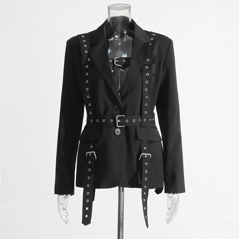 Black jacket with silver embellishments on a mannequin against a white background