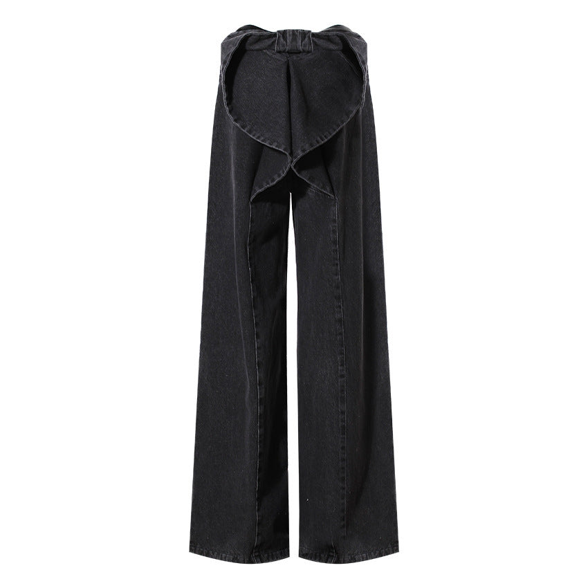 Black wide-leg pants with a ruffled top on a white background