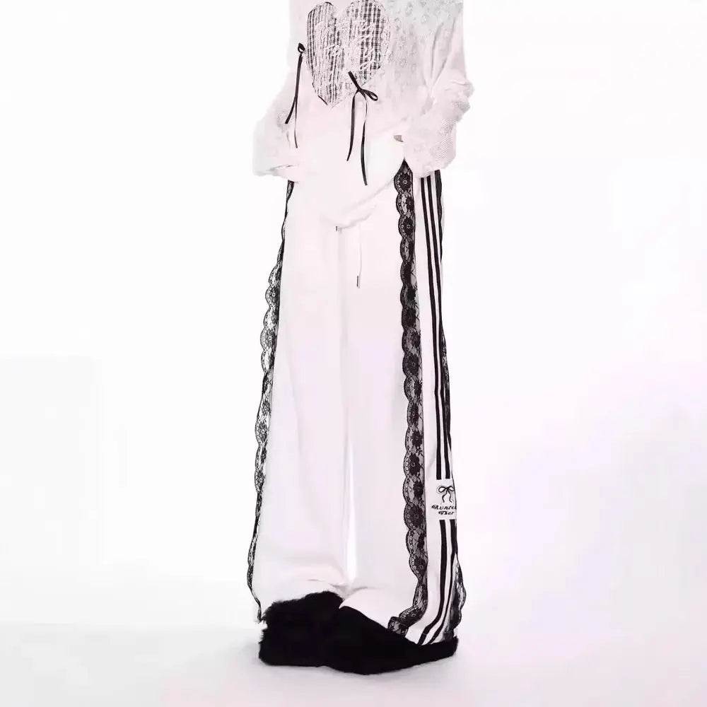 White pants with black and white stripes on a white background