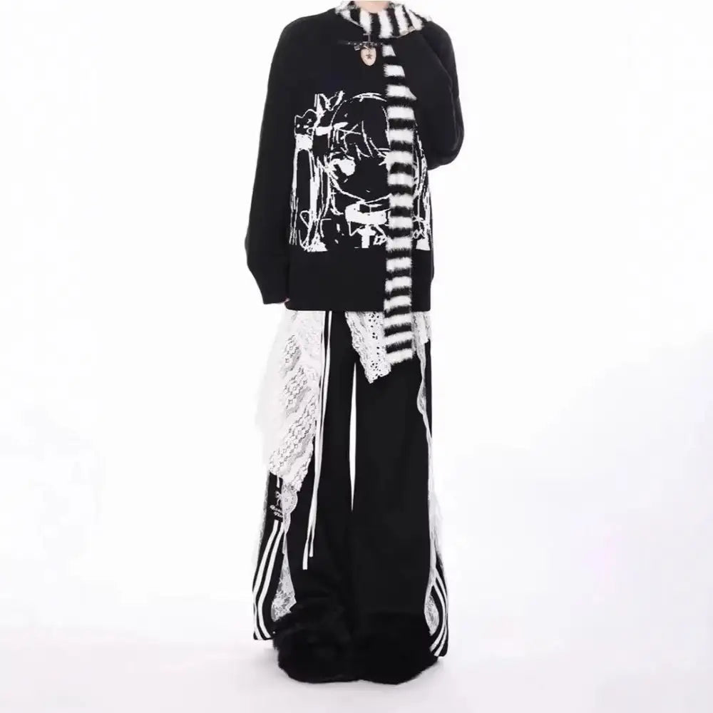 Black and white outfit with a patterned scarf on a white background