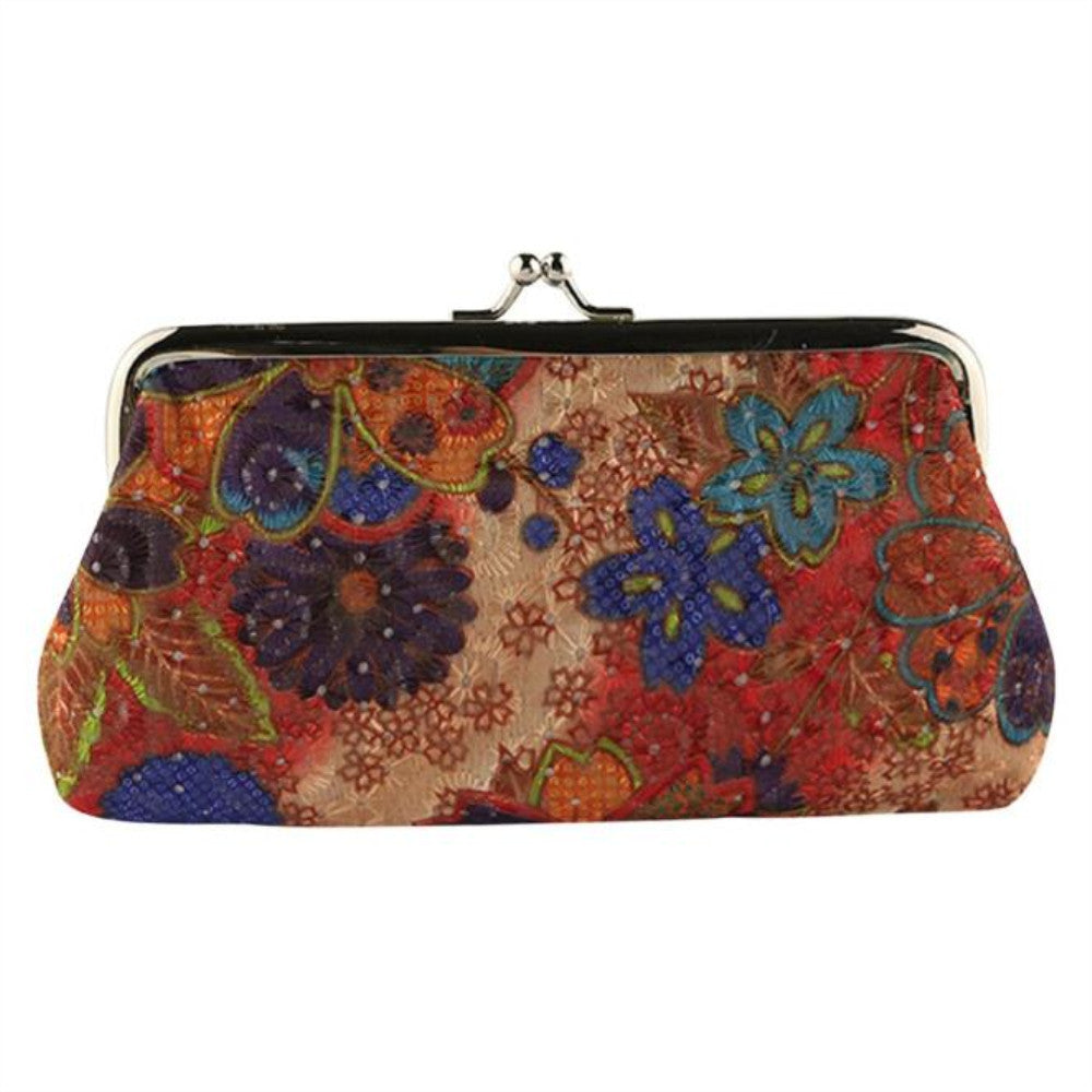 Colorful floral patterned clutch bag on a white background