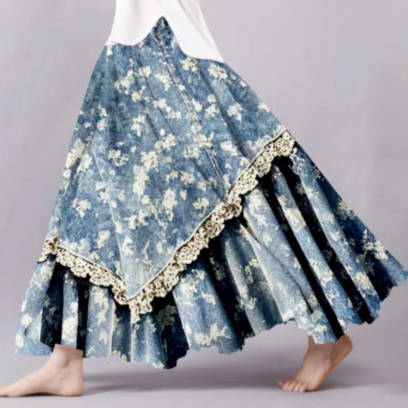 Blue floral skirt with white lace trim on a gray background