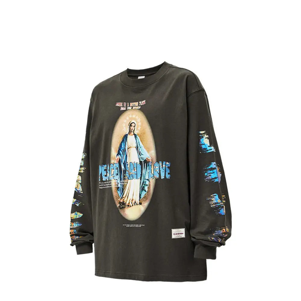 Black long-sleeve shirt with graphic design on a white background