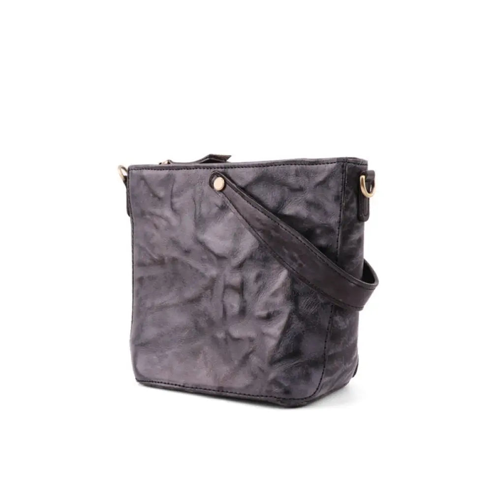 Gray textured crossbody bag on a white background